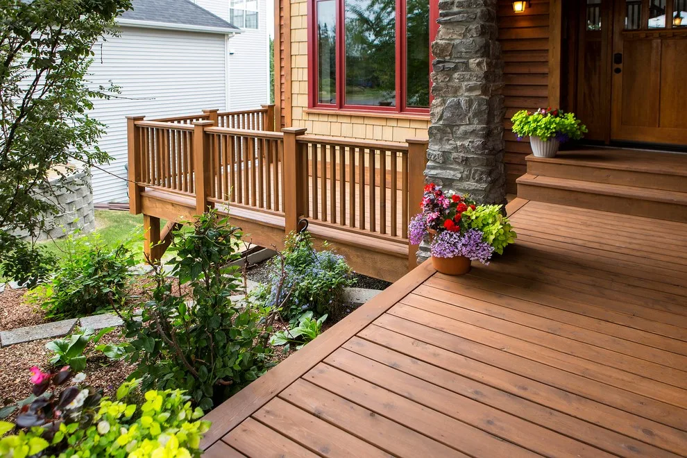 Charming Entryway, Pathway, and Rear Decks Featuring Trex Decking and Cedar Railings by Treeline Construction - Photo 6