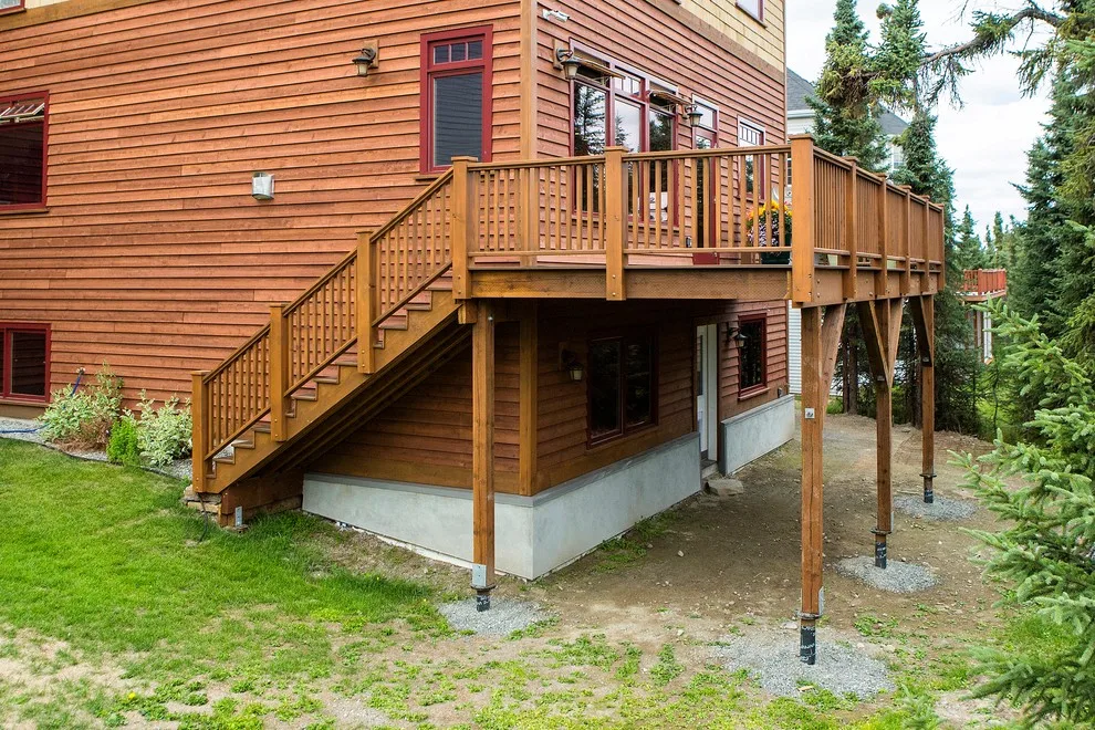 Charming Entryway, Pathway, and Rear Decks Featuring Trex Decking and Cedar Railings by Treeline Construction - Photo 19