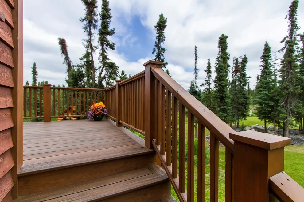 Charming Entryway, Pathway, and Rear Decks Featuring Trex Decking and Cedar Railings by Treeline Construction - Photo 18