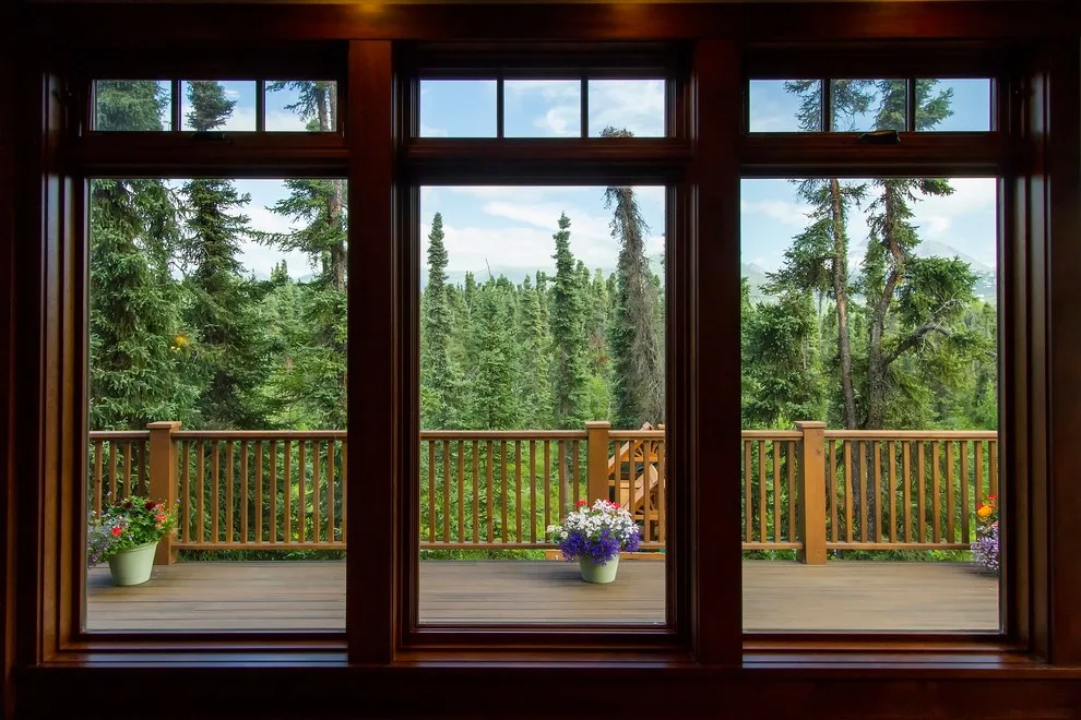 Charming Entryway, Pathway, and Rear Decks Featuring Trex Decking and Cedar Railings by Treeline Construction - Photo 9