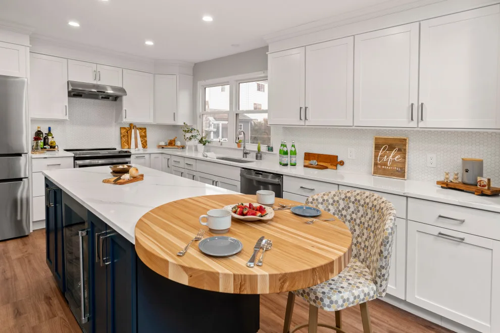 Larger Kitchen with Entertaining Island Top by Inspiration Kitchen And Bath - Photo 2