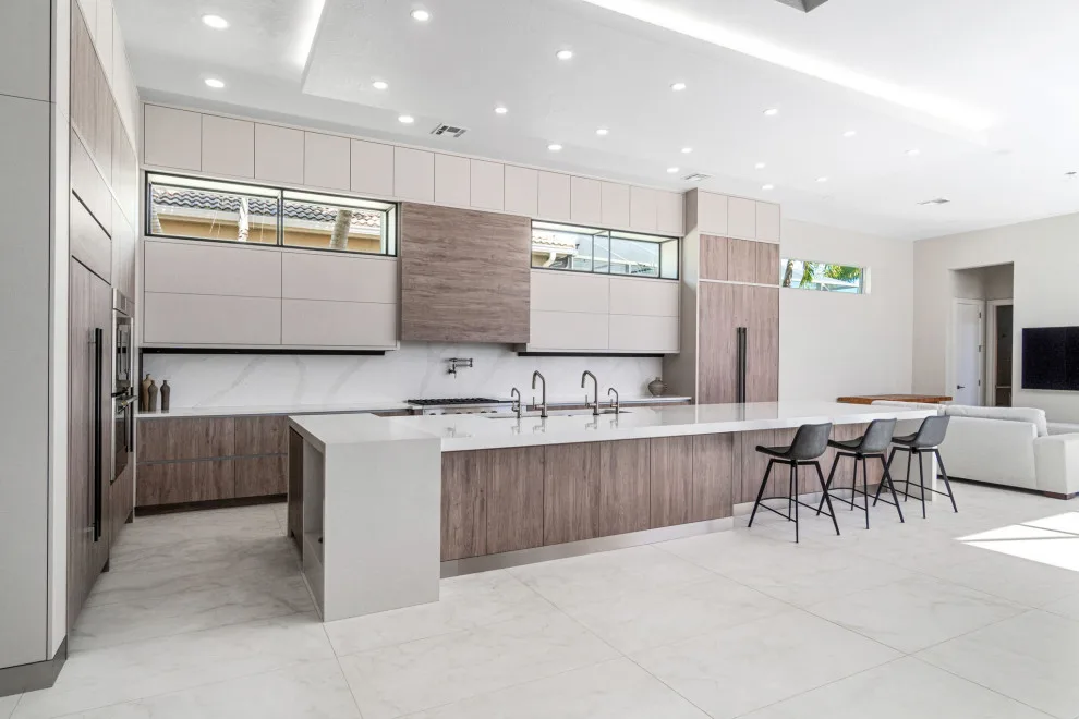 Spacious Modern Two-Tone Kitchen in West Bay by DaVinci Kitchens, Bath, & Cabinetry - Photo 10