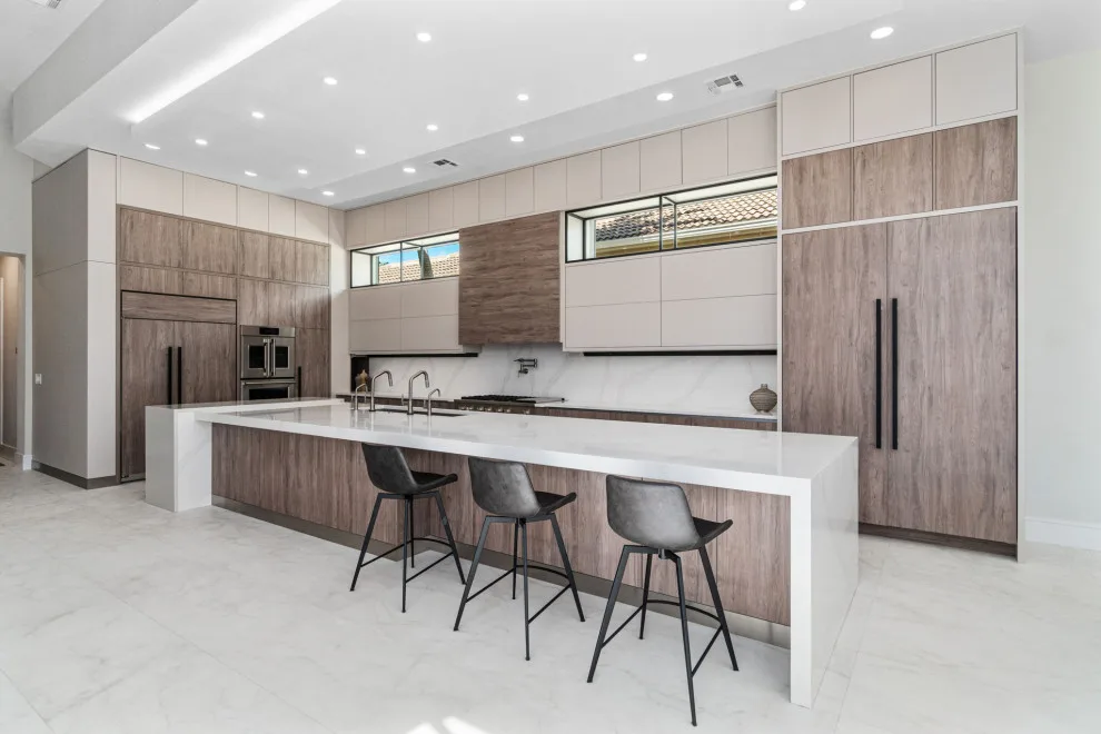 Spacious Modern Two-Tone Kitchen in West Bay by DaVinci Kitchens, Bath, & Cabinetry - Photo 6