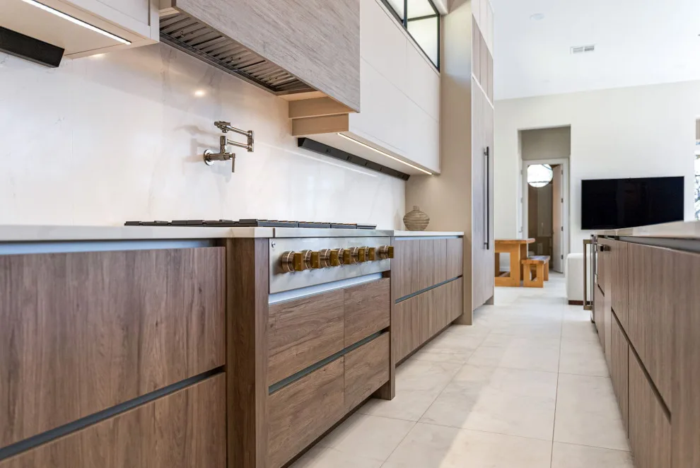 Spacious Modern Two-Tone Kitchen in West Bay by DaVinci Kitchens, Bath, & Cabinetry - Photo 2