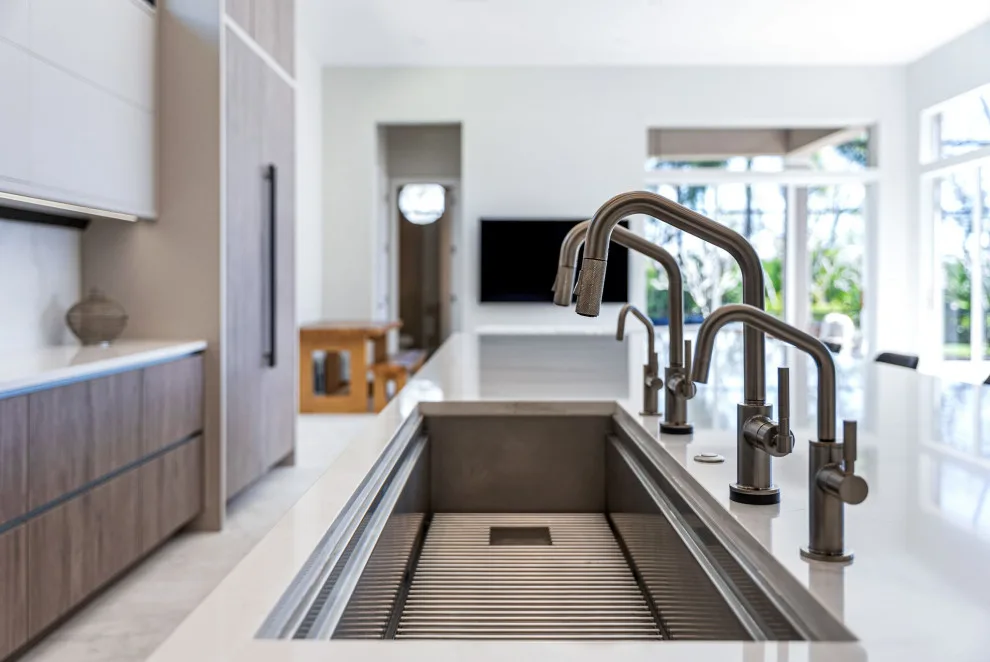 Spacious Modern Two-Tone Kitchen in West Bay by DaVinci Kitchens, Bath, & Cabinetry - Photo 33