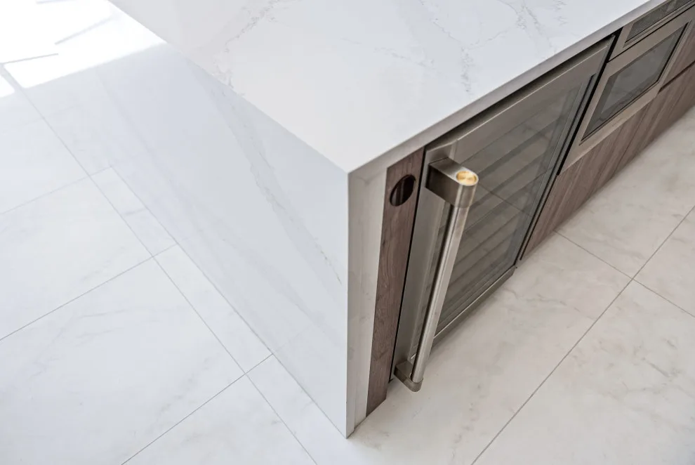 Spacious Modern Two-Tone Kitchen in West Bay by DaVinci Kitchens, Bath, & Cabinetry - Photo 14