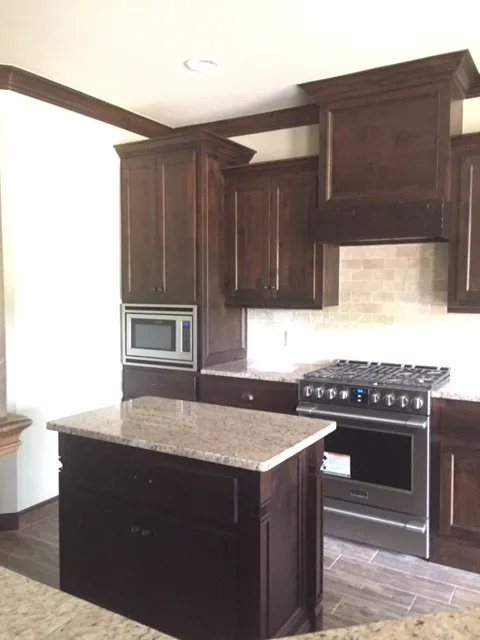 Classic Dark Wood Culinary Space by Anderson Trim Inc - Photo 6