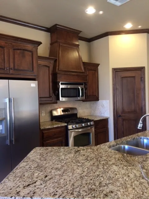 Classic Dark Wood Culinary Space by Anderson Trim Inc - Photo 2