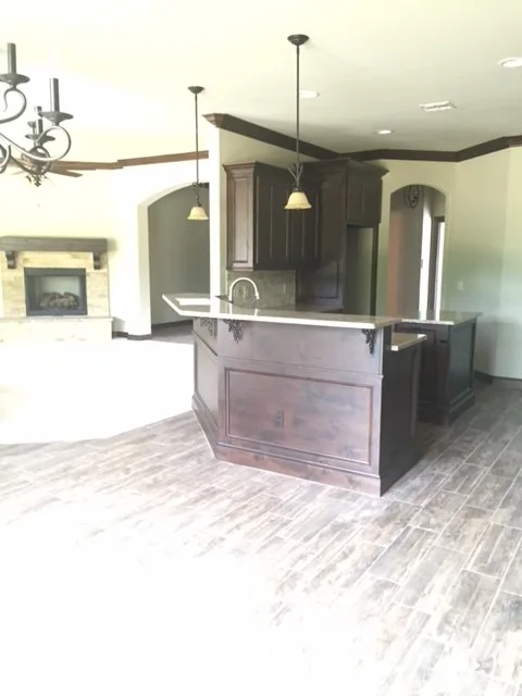 Classic Dark Wood Culinary Space by Anderson Trim Inc - Photo 9