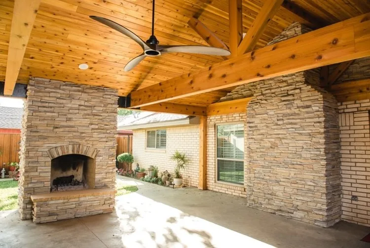 Exterior Stone Fireplace with Cedar Roof and Ceiling by ABC Contractors - Photo 3