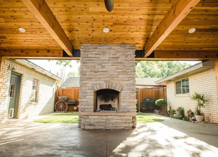 Exterior Stone Fireplace with Cedar Roof and Ceiling by ABC Contractors - Photo 4