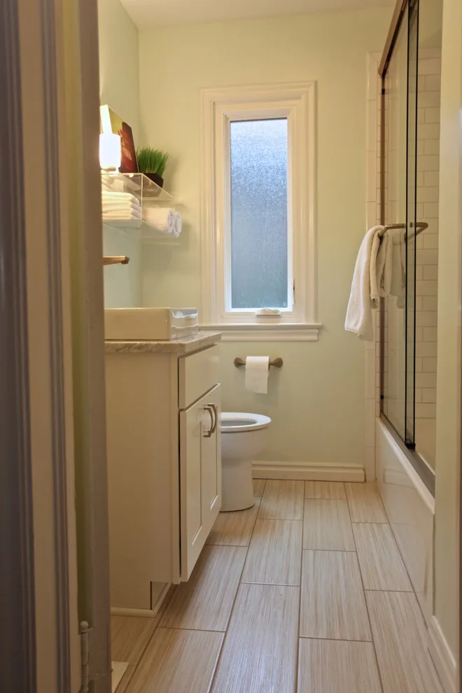 Compact Transitional Bathroom by Booher Remodeling Company - Photo 3
