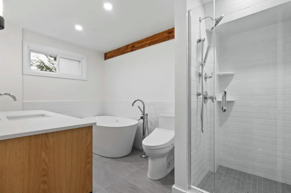 Contemporary Bathroom Makeover by WOTW Construction Llc - Photo 9