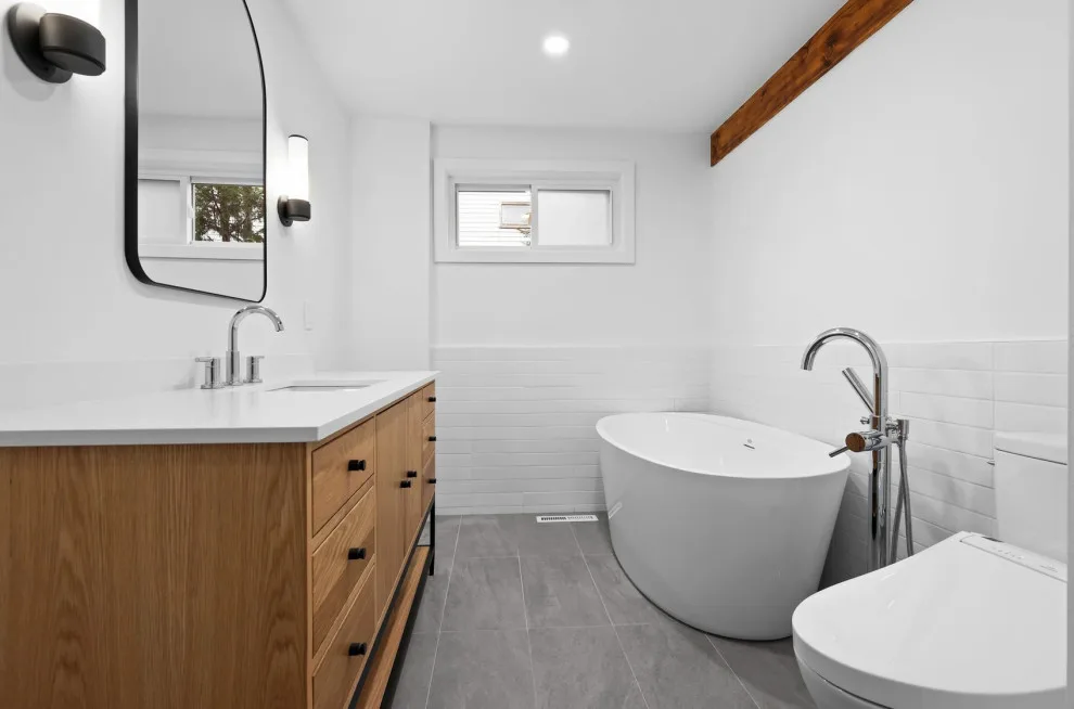 Contemporary Bathroom Makeover by WOTW Construction Llc - Photo 4
