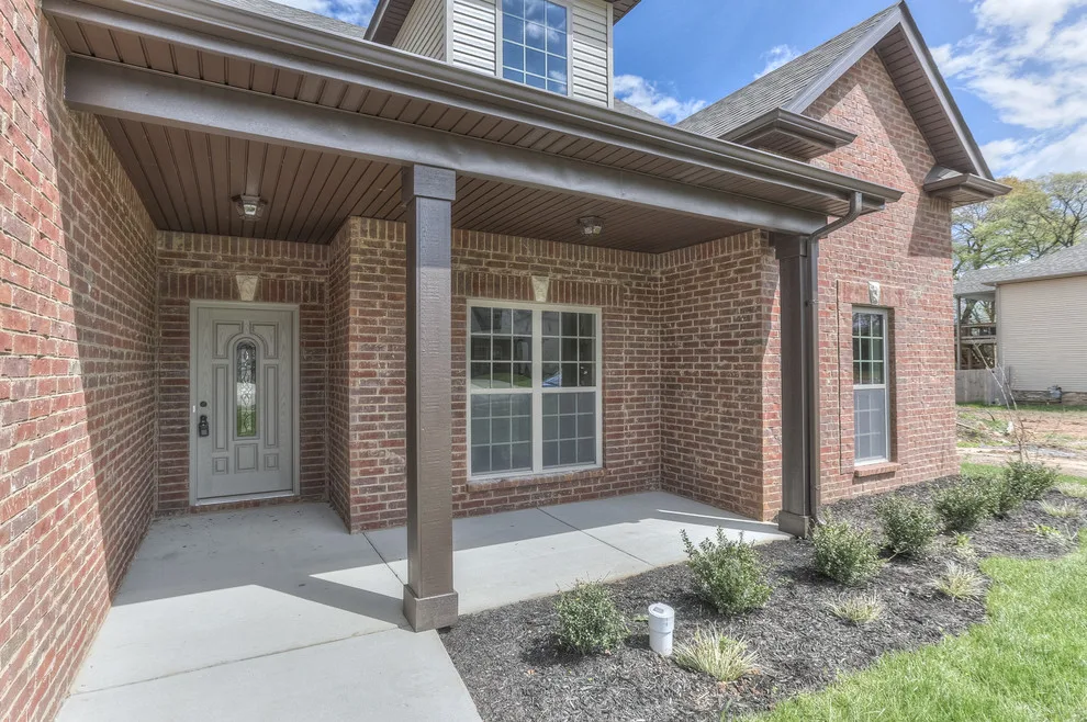 Ranch Layout Featuring Lovely Covered Porches by Crabbe Homes - Photo 4