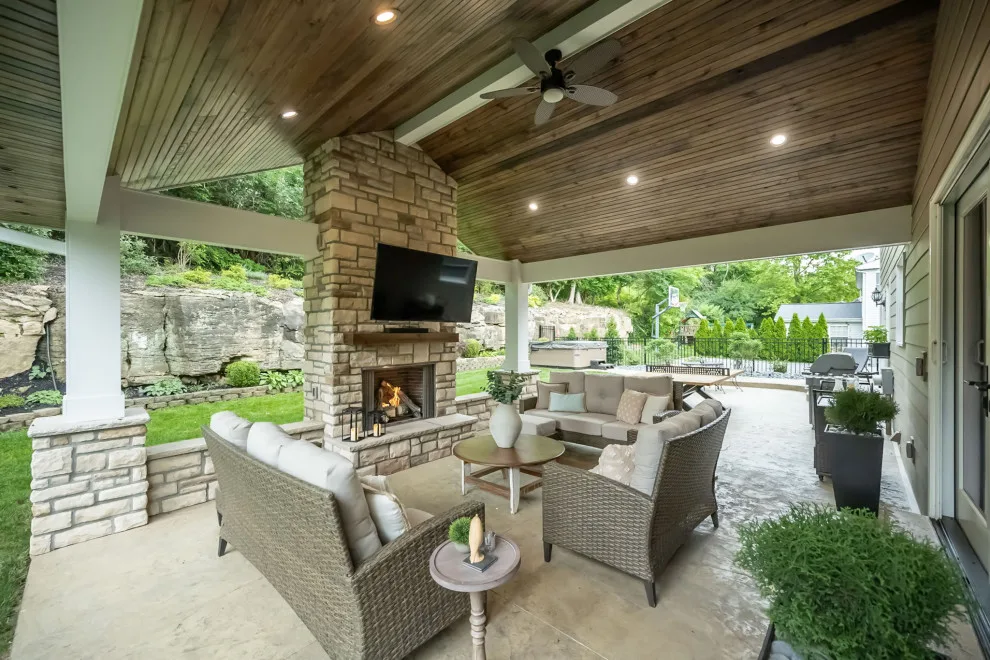 Back Patio Awning with Stone Hearth by Lakeside Renovation & Design - Photo 2