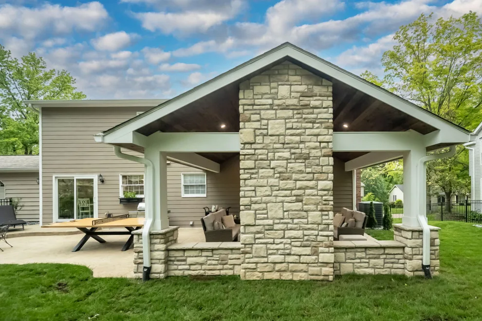 Back Patio Awning with Stone Hearth by Lakeside Renovation & Design - Photo 3