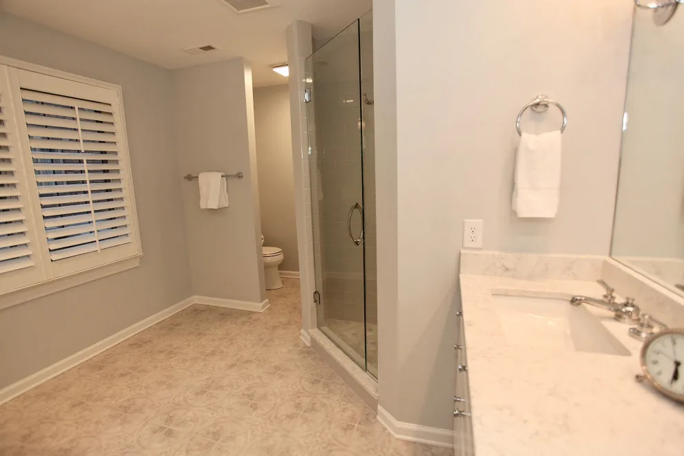 Revitalizing the White and Grey Master Bathroom by Booher Remodeling Company - Photo 6