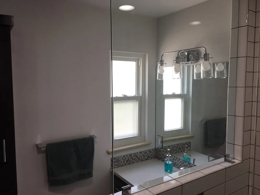 Updated White Bathroom by Carlisle Builders - Photo 6