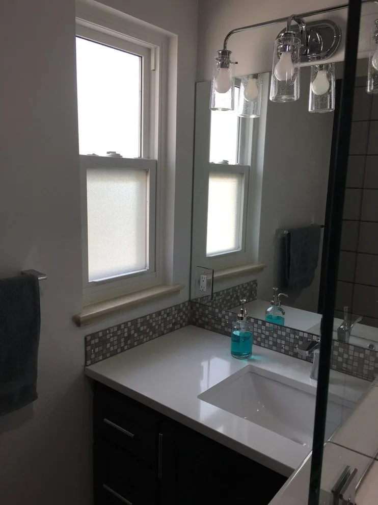 Updated White Bathroom by Carlisle Builders - Photo 7