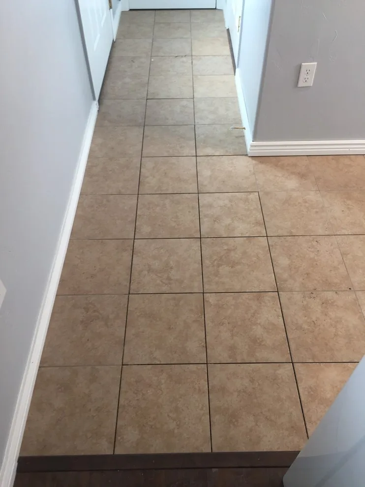 Floor Tile Replacement After Water Damage Repair by Big Horn Construction, LTD - Photo 3