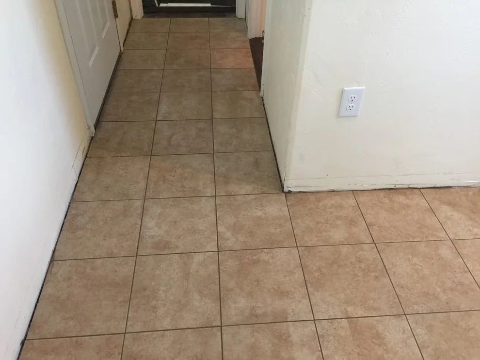Tile Replacement Following Water Damage Repair by Big Horn Construction, LTD - Photo 2