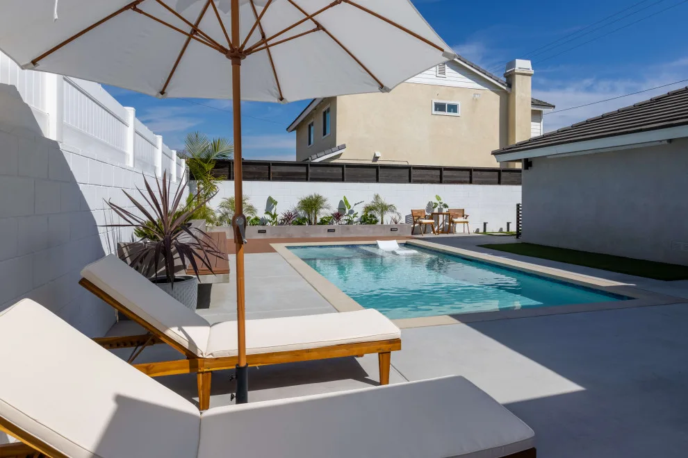 Backyard Patio with Resort Vibes by Royal Family Construction, Inc. - Photo 23