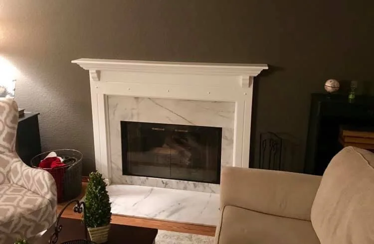 Feature wall and fireplace mantle by Grit City Painters - Photo 2