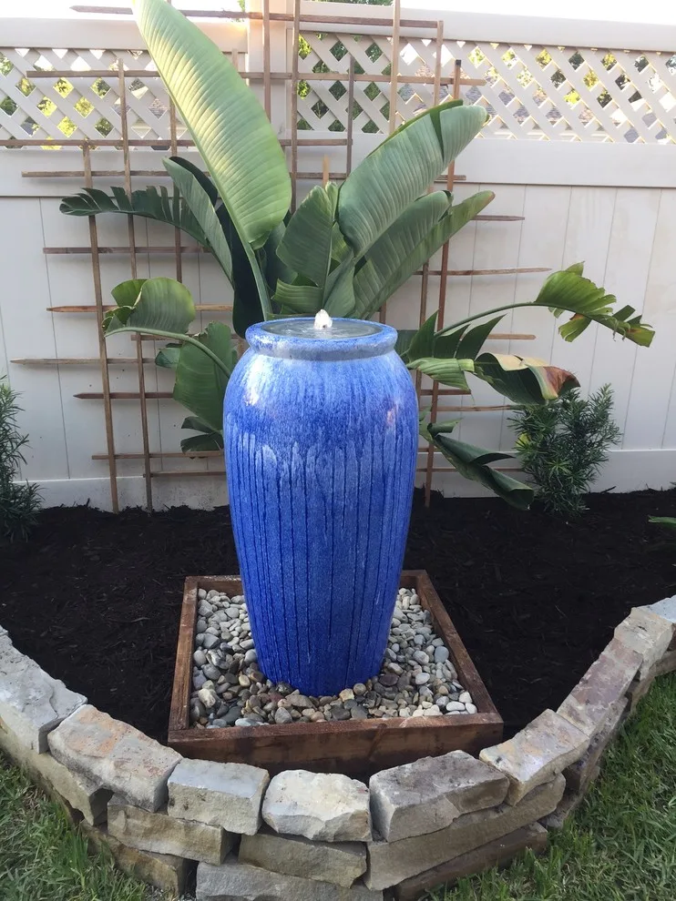 Tropical Oasis Backyard by WelcomeScape Curb Appeal Designs - Photo 8
