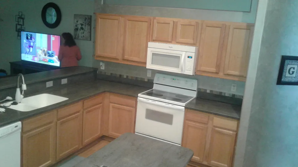 Kitchen Transformation: Before and After Paint Job by Ocean Wave Painting - Photo 4