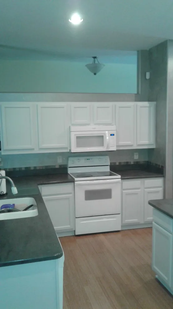 Kitchen Transformation: Before and After Paint Job by Ocean Wave Painting - Photo 3