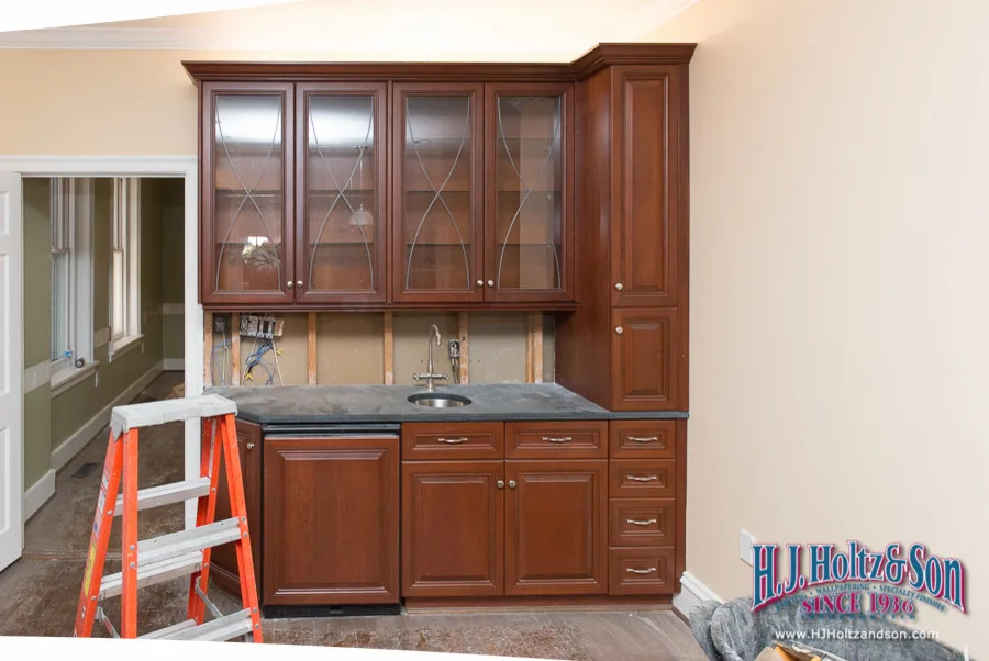 White Cabinetry with Paint Finish by H.J. Holtz And Son, Inc. - Photo 26