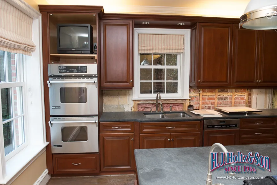 White Cabinetry with Paint Finish by H.J. Holtz And Son, Inc. - Photo 27