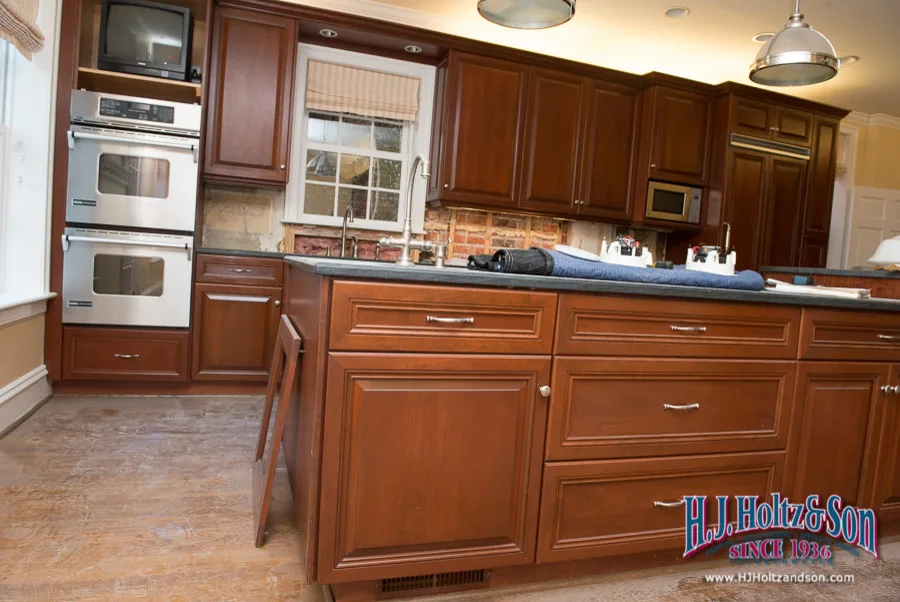 White Cabinetry with Paint Finish by H.J. Holtz And Son, Inc. - Photo 25