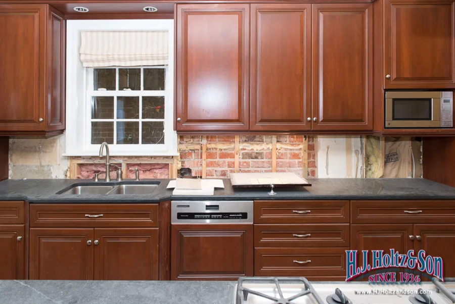 White Cabinetry with Paint Finish by H.J. Holtz And Son, Inc. - Photo 15