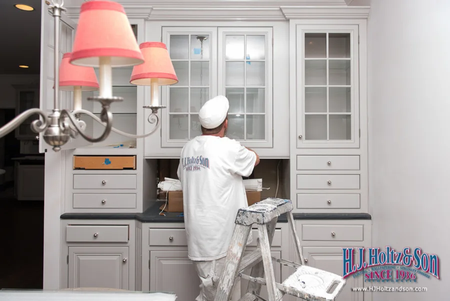 White Cabinetry with Paint Finish by H.J. Holtz And Son, Inc. - Photo 38