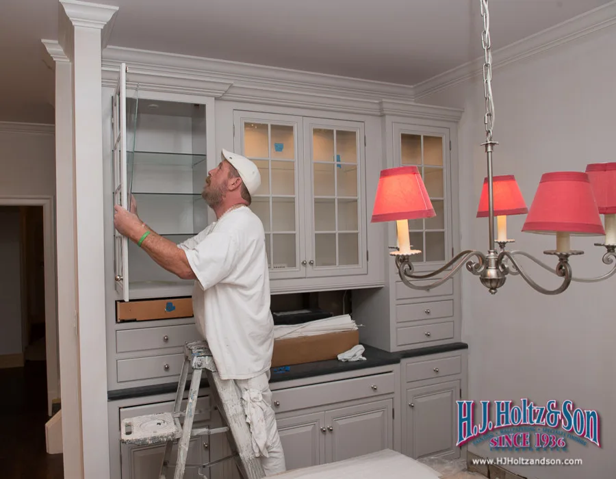White Cabinetry with Paint Finish by H.J. Holtz And Son, Inc. - Photo 35