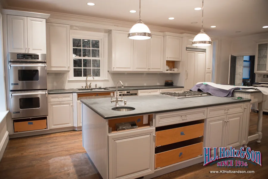White Cabinetry with Paint Finish by H.J. Holtz And Son, Inc. - Photo 36
