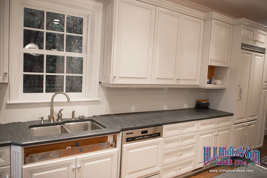 White Cabinetry with Paint Finish by H.J. Holtz And Son, Inc. - Photo 32