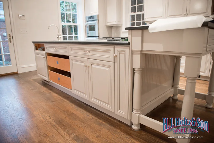 White Cabinetry with Paint Finish by H.J. Holtz And Son, Inc. - Photo 11