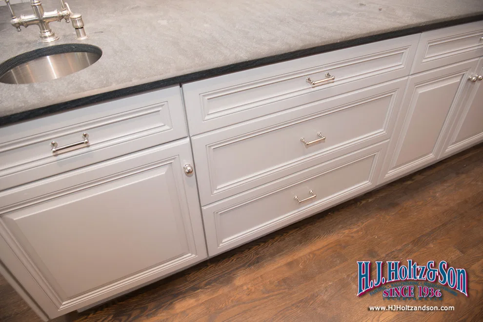 White Cabinetry with Paint Finish by H.J. Holtz And Son, Inc. - Photo 13