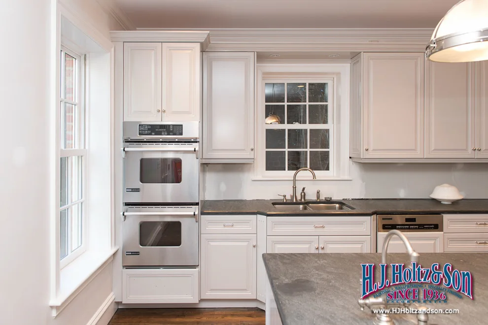 White Cabinetry with Paint Finish by H.J. Holtz And Son, Inc. - Photo 31