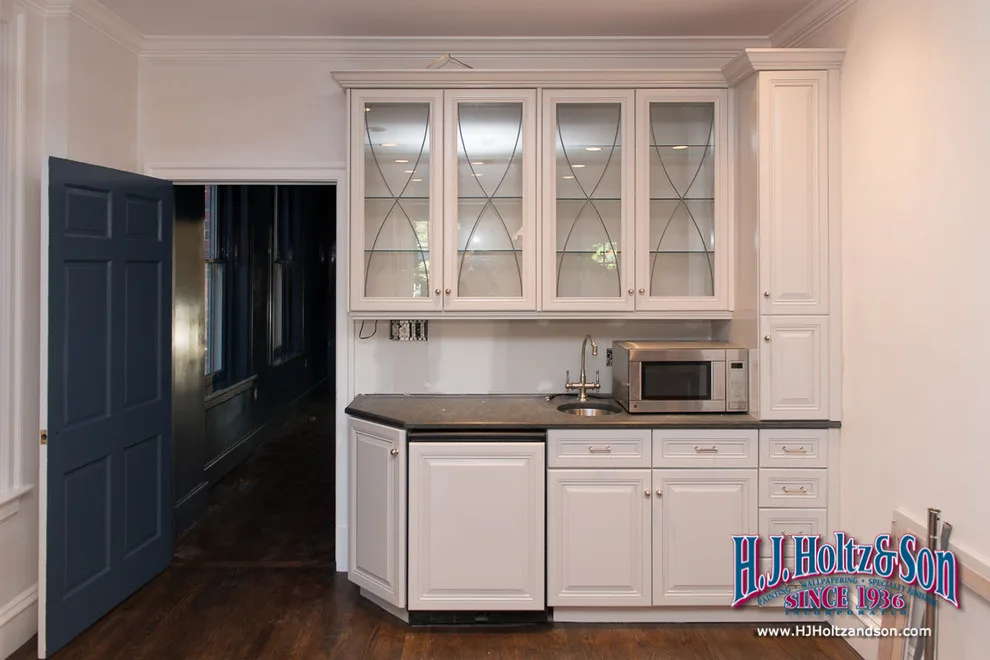 White Cabinetry with Paint Finish by H.J. Holtz And Son, Inc. - Photo 16
