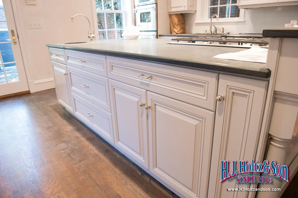 White Cabinetry with Paint Finish by H.J. Holtz And Son, Inc. - Photo 34