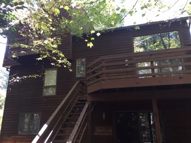 Cedar siding exterior re-staining in Reston, VA by Hömm Certified Painting Systems - Photo 9