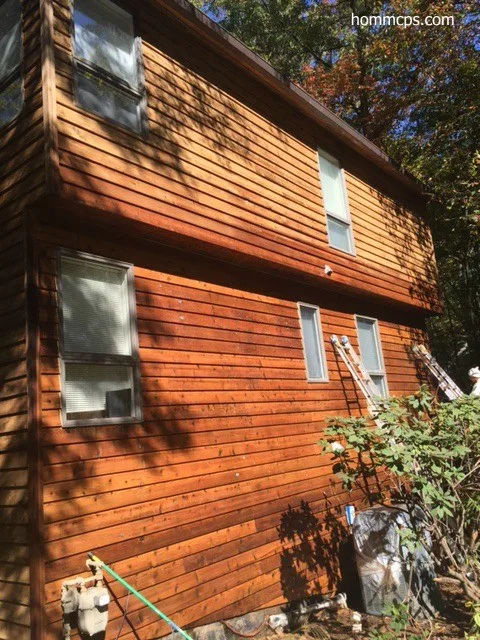 Cedar siding exterior re-staining in Reston, VA by Hömm Certified Painting Systems - Photo 3