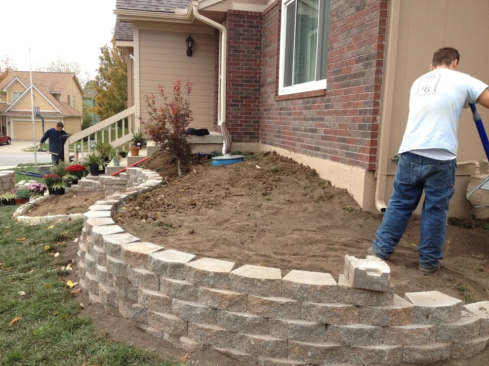 New landscape & retaining wall by Garden Gate Lawn & Landscape, LLC - Photo 3
