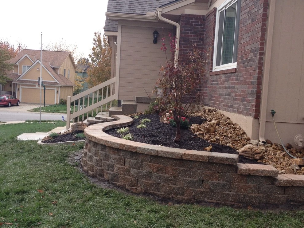 New landscape & retaining wall by Garden Gate Lawn & Landscape, LLC - Photo 4