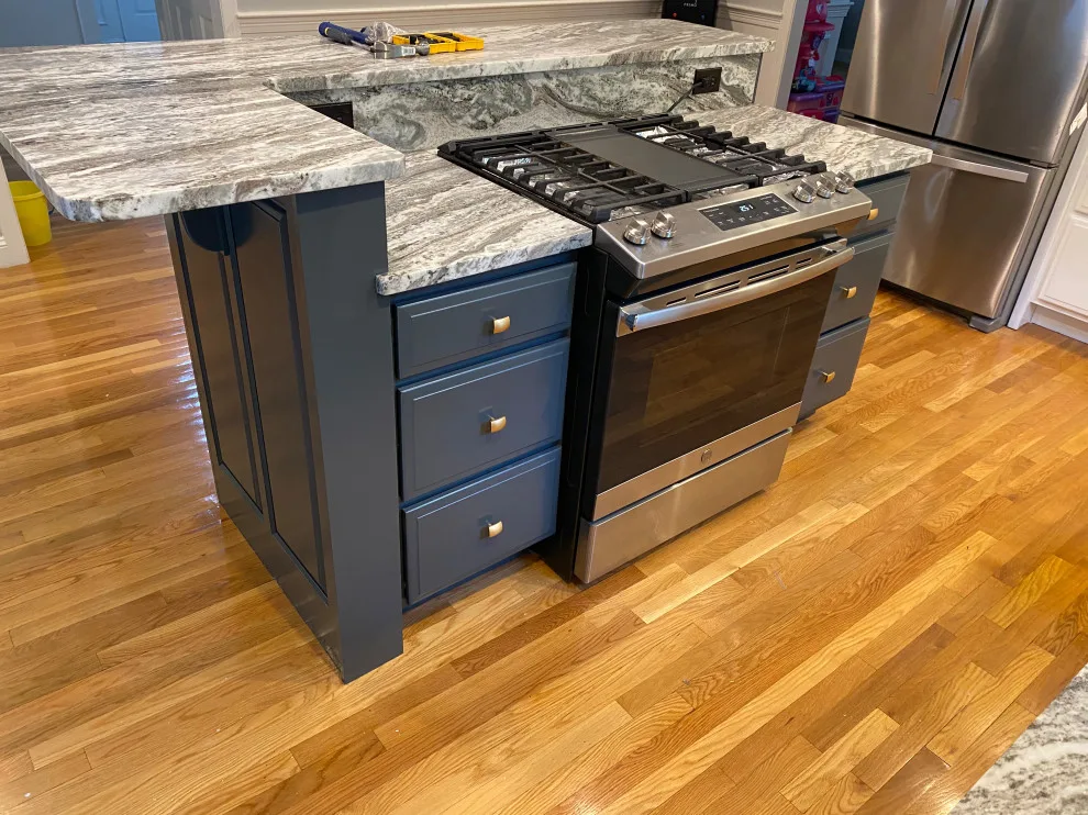 Cabinet makeover in a stunning hue by Gölsmith Painting Company - Photo 7