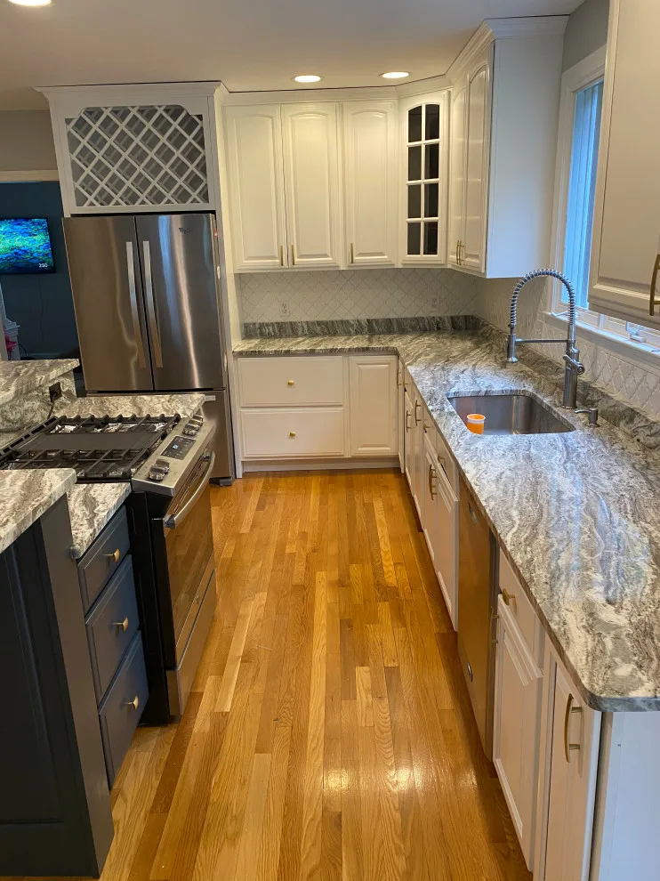 Cabinet makeover in a stunning hue by Gölsmith Painting Company - Photo 11